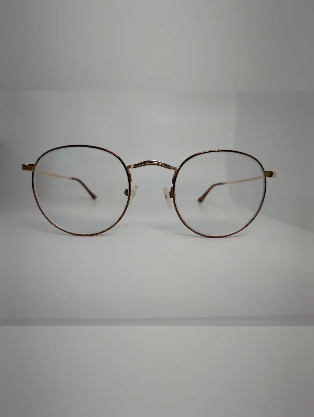 Daydream. Classic Round Metal Frame, Copper Eyewire. Gloss Gold Bridge, Temples.